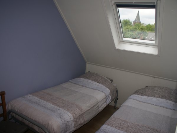 Een van de tweepersoonskamer boven