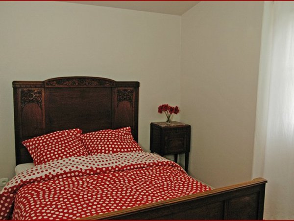 Eén van de vijf slaapkamers.